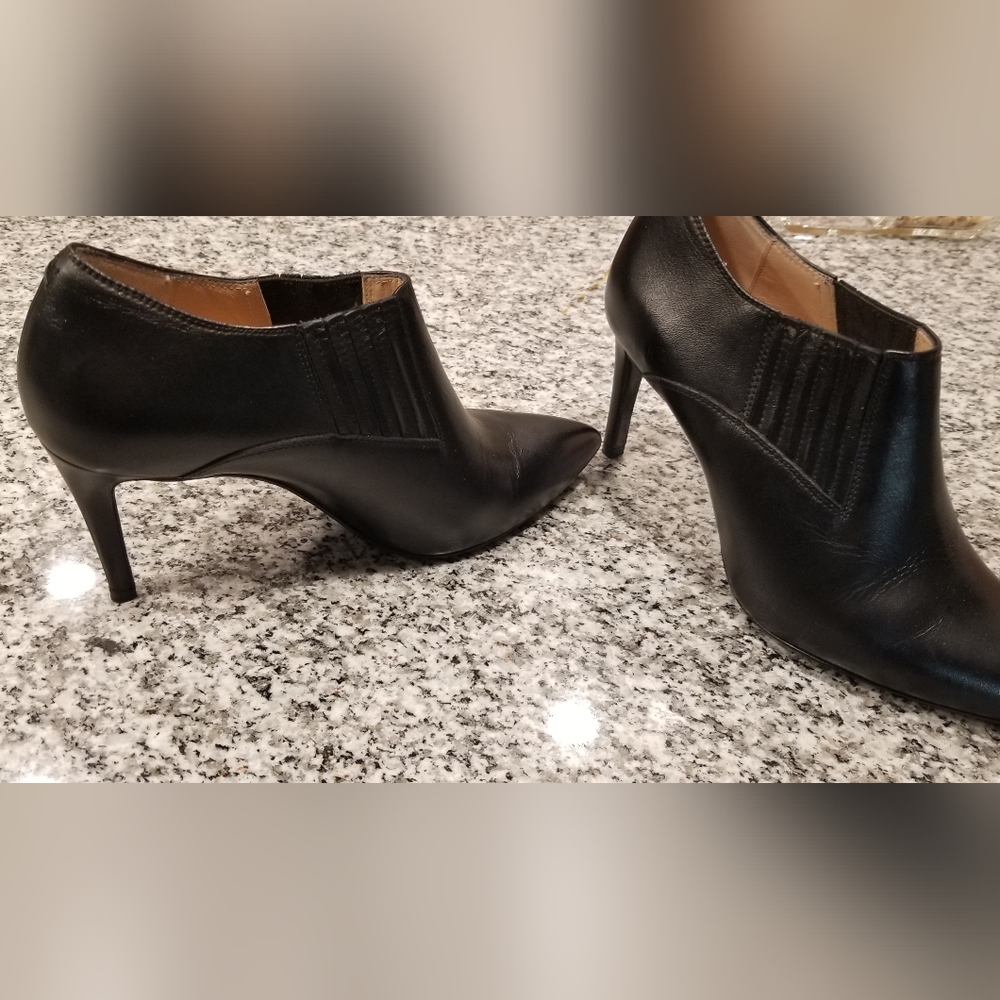 Inez Spanish crafted bootie.  Worn once on carpet